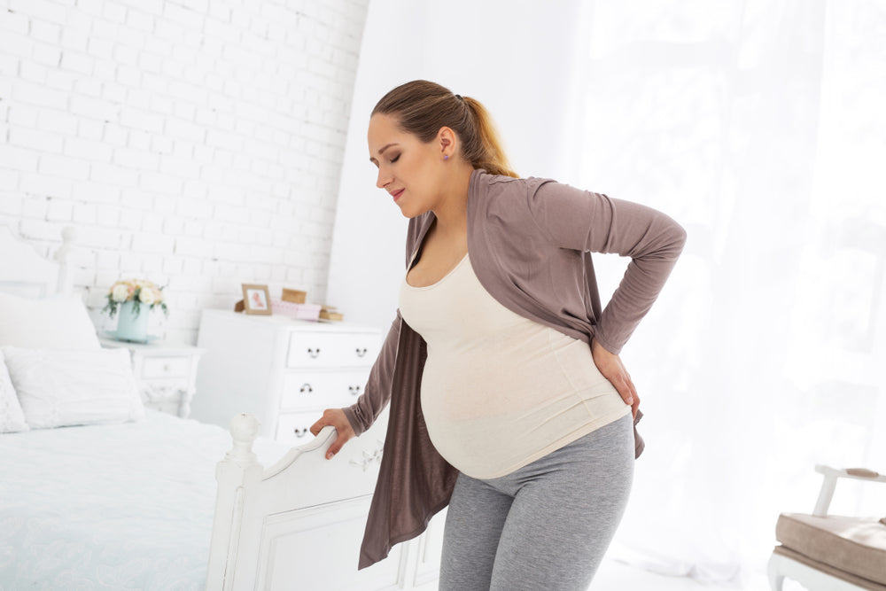 Pregnant woman suffers from back pain